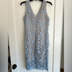 Soprano lace blue knee length dress, nude underliner.